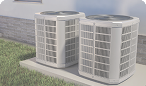 Two HVAC condenser units on the same pad