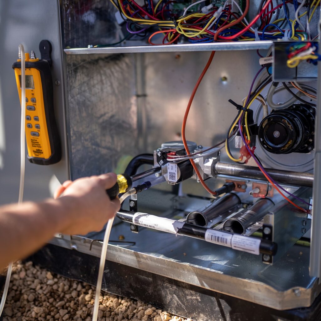Heat pump being serviced