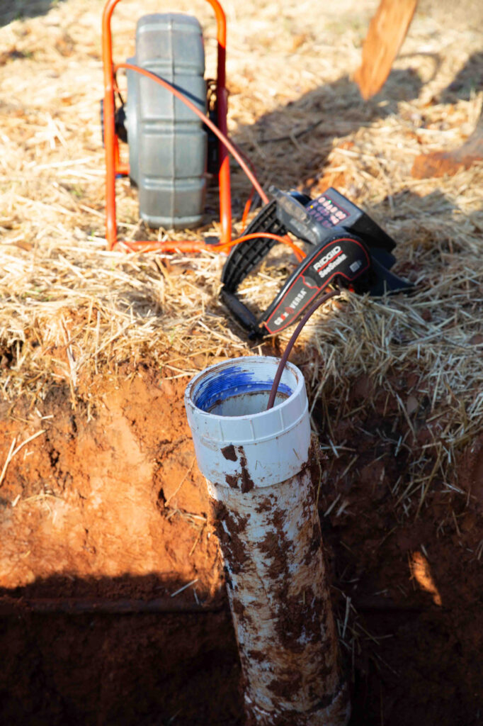 Sewer line segment with a video camera line down it to inspect