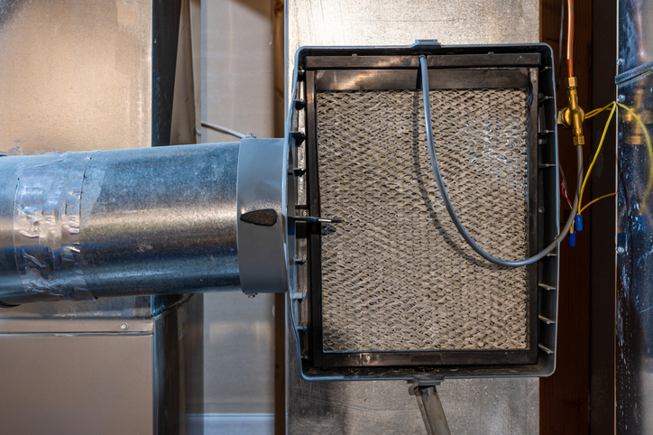 Whole house humidifier used in colder climate areas to increase indoor humidity for comfort