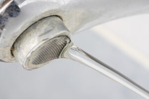 Hard water buildup on sink faucet
