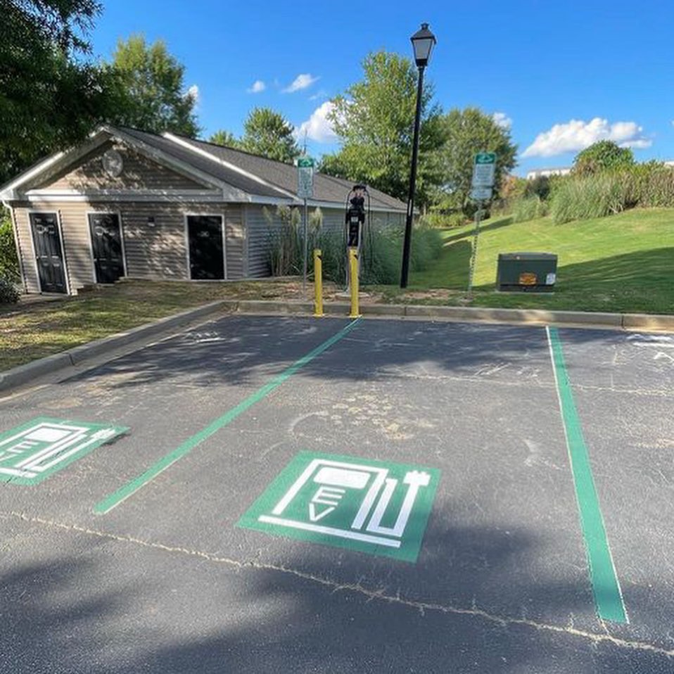EV charger installed in a business parking lot by Roby