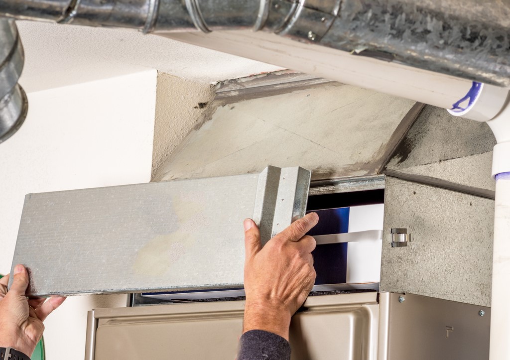 Removal of furnace access door for filter